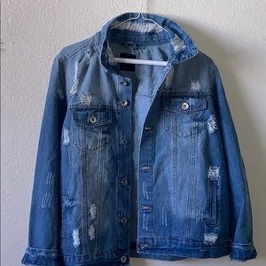 Multiple washed denim jacket with rips